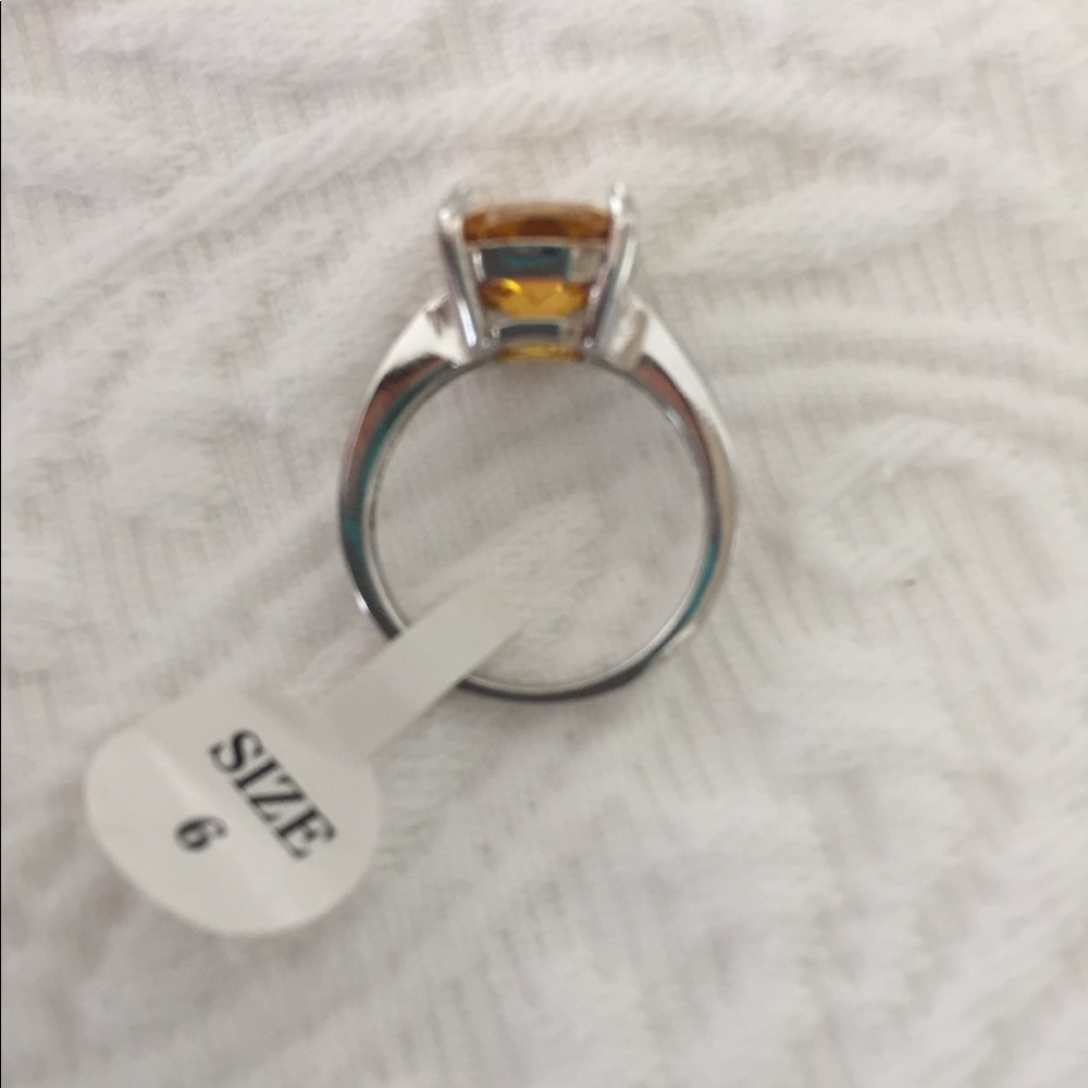 Emerald cut canary yellow diamond cubic zirconia - Picture 6 of 6